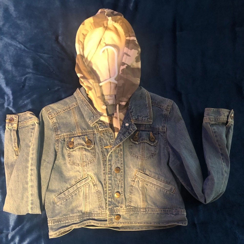 Jean jacket with camo hoodie.